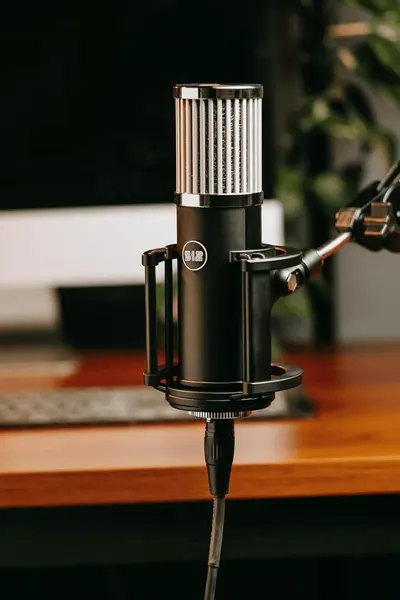 Showcases the product in a real-world professional environment to help shoppers visualize how it would look and fit in their own workspace or studio setup.
