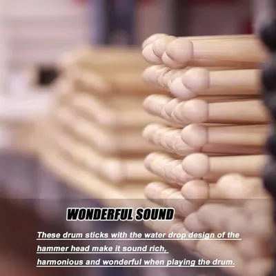 Highlights the unique water drop design of the drumstick hammer head, explaining how this specific physical feature creates rich, harmonious sound quality when playing. Communicates the key benefit…