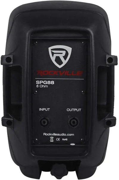 Shows the back panel of the speaker with technical specifications, input/output ports, and brand information for shoppers who want to see the product's connectivity and technical details.