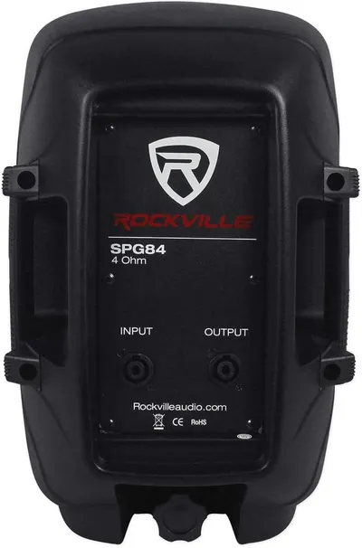 Shows the back panel of the speaker with technical specifications, input/output ports, and brand information for shoppers who want to see the product's connectivity and technical details.