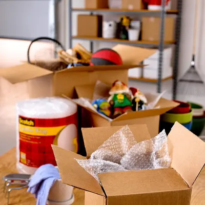 Demonstrates the product's use in a real-world moving or organizing scenario, showing how it helps pack and protect household items during relocation or storage.