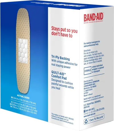 Communicates multiple distinct product benefits including adhesive staying power and cushioned comfort pad to reassure shoppers of the bandage's superior performance and comfort.