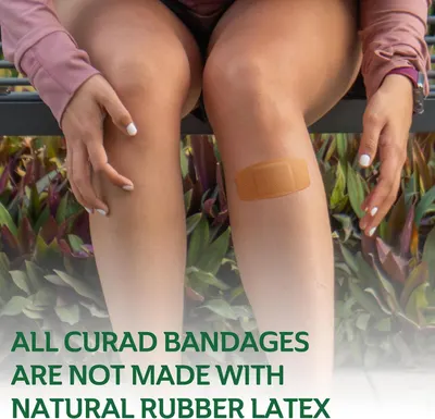 Differentiates this brand's bandages from competitors by highlighting that they are made with natural rubber latex, positioning the product as a superior or more natural choice.
