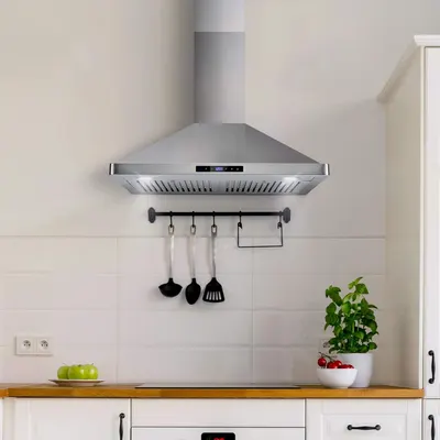 Demonstrates the product installed in a real kitchen environment to help shoppers visualize how it would look in their own home.