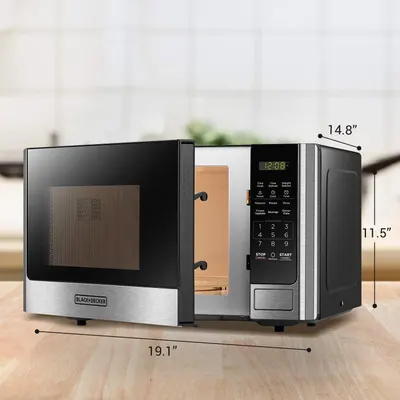 Communicates the exact physical dimensions of the microwave (19.1 x 14.8 x 11.5 inches) to help shoppers determine if it will fit in their kitchen space.