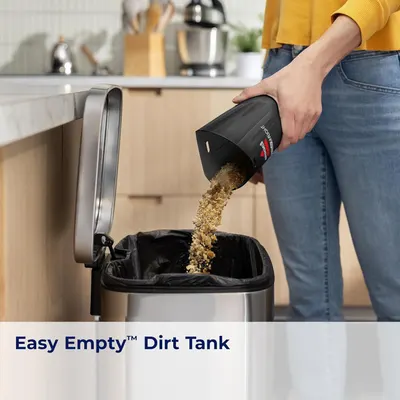 Demonstrates how simple and convenient it is to empty the vacuum's dirt tank directly into the trash, reassuring shoppers about hassle-free maintenance. Highlights the convenience and ease of…