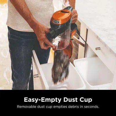 Demonstrates the convenience of the removable dust cup feature, showing how quickly and easily users can empty debris in seconds.