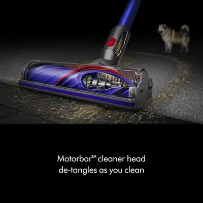 Shows the internal structure and mechanism of the vacuum cleaner head to demonstrate how the Motorbar technology works to prevent hair tangles during cleaning. Communicates the key benefit that the…