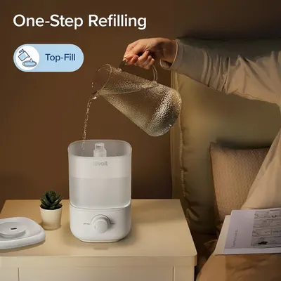 Demonstrates the simple, convenient top-fill refilling process to reassure shoppers that maintaining the humidifier is easy and mess-free. Highlights the ease-of-use benefit of the top-fill design,…