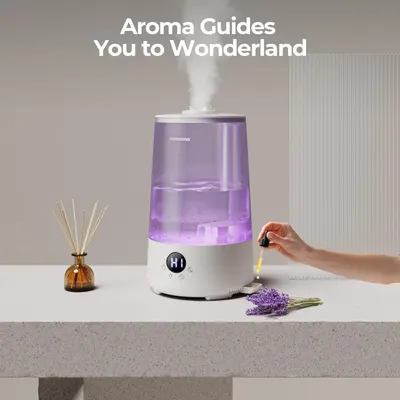 Showcases the humidifier in a real-world home setting with aromatherapy elements to help shoppers visualize the product creating a relaxing, spa-like atmosphere in their own space.