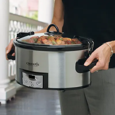 Demonstrates the product's portability and ease of carrying with secure handles, showing it in a real-world kitchen context to help shoppers visualize using it in their own homes.