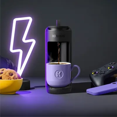 Positions the Keurig coffee maker as part of a modern gaming lifestyle, creating an aspirational and relatable context for the target audience.