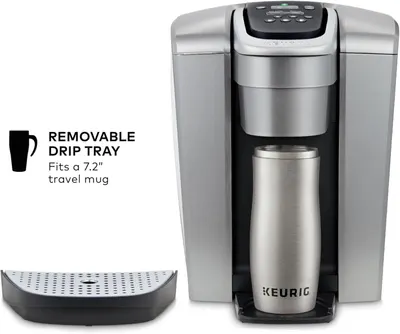 Highlights the removable drip tray feature and its compatibility with a 7.2-inch travel mug, reassuring shoppers about the product's versatility and ease of cleaning. Communicates the key benefit…