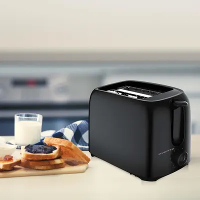 Shows the toaster in a real-world breakfast context to help shoppers visualize the product in their own home and daily routine.