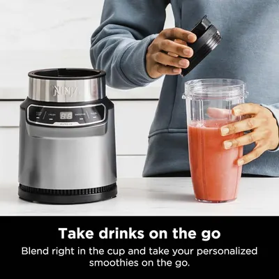 Communicates the convenience of blending directly in a portable cup that can be taken on the go, emphasizing the product's portability and ease of use for busy lifestyles.