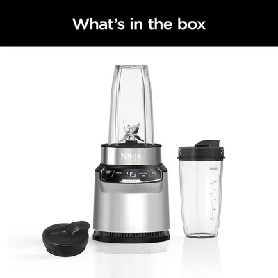 Shows all components included with the Ninja blender purchase: the main blender base unit, two blending cups of different sizes, and two lids, helping shoppers understand the complete value of what…