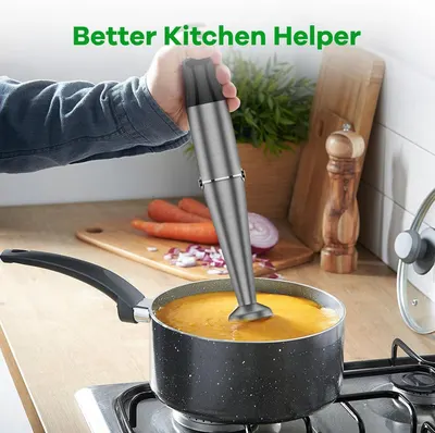 Demonstrates the product being used in a real kitchen environment to help shoppers visualize how the immersion blender fits into everyday cooking scenarios.