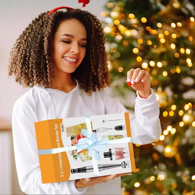 Positions the product as a perfect holiday gift by showing it wrapped with a ribbon in a festive Christmas setting, encouraging seasonal purchase intent.