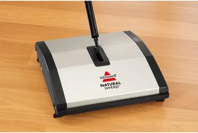 Shows the product in a real-world home setting to help shoppers visualize how it looks and functions on hardwood floors.