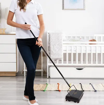 Demonstrates the product being used in a real-world nursery setting to show shoppers how it fits naturally into their daily cleaning routine around children.