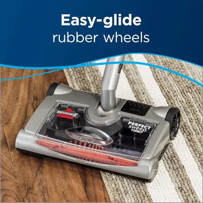 Highlights the easy-glide rubber wheels feature to reassure shoppers that the vacuum moves smoothly across different floor types without causing damage or resistance.