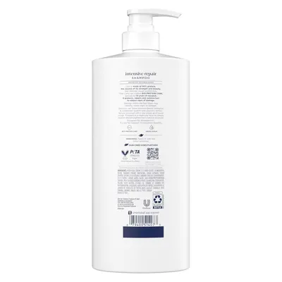 Shows the back of the shampoo bottle with all product information, ingredients, certifications, and usage directions visible for shopper reference.