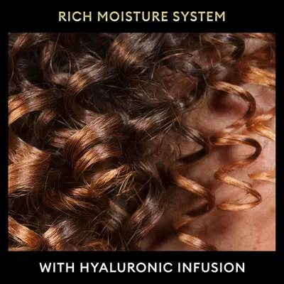 Highlights the product's moisturizing technology featuring hyaluronic acid to communicate hydration benefits and appeal to shoppers seeking hair moisture and shine.