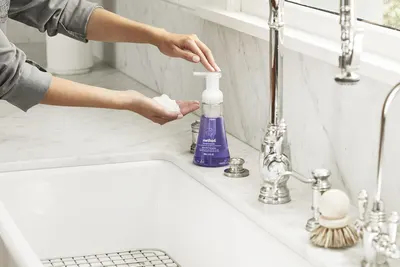 Shows the product being used naturally in a real bathroom environment to help shoppers visualize the product in their own home.