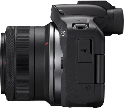 Provides a clean, catalog-style view of the camera from the side profile, allowing shoppers to see the physical design, build, and key features like the lens, viewfinder, and MIC port without…