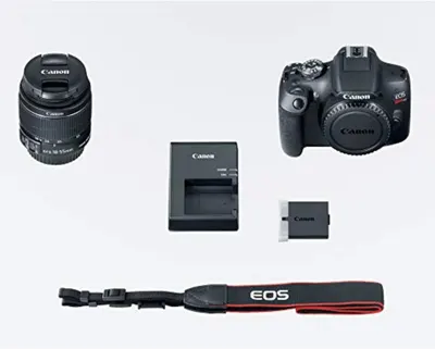 Shows all the components included with the Canon EOS camera purchase, including the camera body, lens, battery charger, battery, and camera strap, helping shoppers understand the complete package…