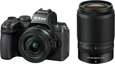 Shows the customer exactly what they receive in the kit: a Nikon Z camera body with mounted lens and an additional DX 50-250mm telephoto lens, demonstrating the complete bundle value.