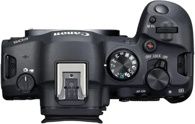 Provides a clean, catalog-style view of the camera body from above, showing the control layout and design without distractions.
