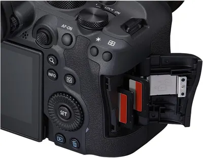 Shows the physical layout of the camera's back panel, highlighting the dual memory card slots and various control buttons to help shoppers understand the camera's interface and storage capabilities.