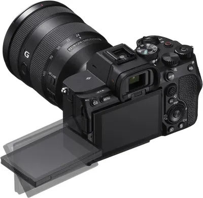 Shows the camera with its flip-out LCD screen extended, allowing shoppers to see the vari-angle display feature and overall product design from a rear angle.