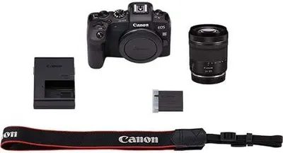 Shows the customer everything included in the purchase: camera body, lens, battery, charger, and strap, providing transparency and setting clear expectations.