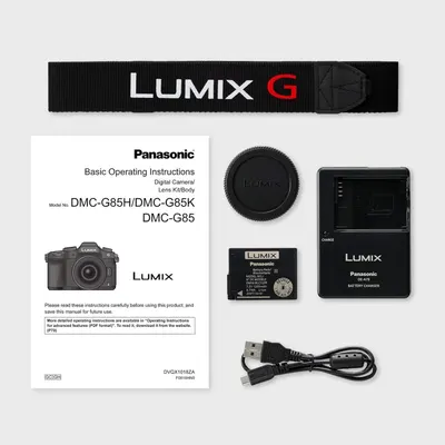 Shows all items included with the Panasonic Lumix G85 camera purchase, including the camera strap, instruction manual, lens cap, battery, charger, and USB cable, to set clear expectations for what…