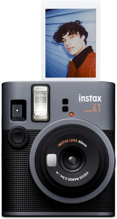 Displays the instant camera product with a sample photo output to demonstrate the product's capability and instant print feature, helping shoppers visualize what they will receive and how the camera…