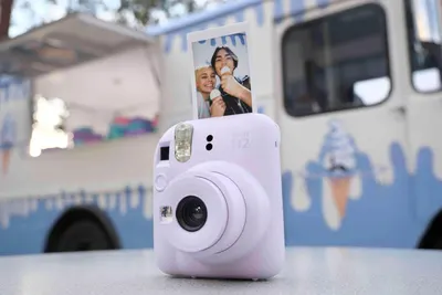 Demonstrates the product in a real-world outdoor setting to show how it fits into everyday lifestyle moments and social experiences.