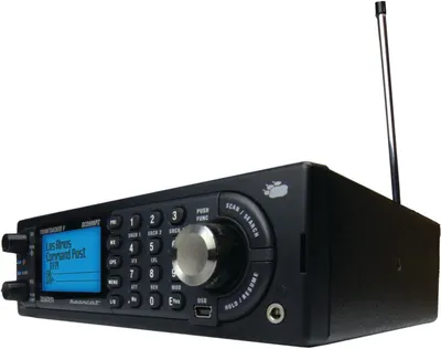 Provides a clean, catalog-style view of the police scanner radio device to show its physical appearance, control panel, display screen, and antenna without distractions.