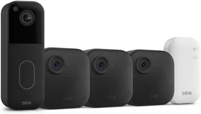 Shows all the components included in the security system package, including the doorbell camera, multiple indoor cameras, and the sync module hub.