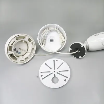 Shows the disassembled parts and internal structure of the security camera to help shoppers understand the build quality, installation components, and how the product is constructed. Demonstrates…
