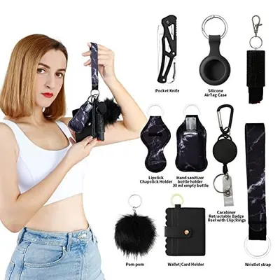 Shows all the items included in the purchase—a comprehensive set of accessories like pocket knife, AirTag case, chapstick holder, hand sanitizer holder, pom pom, wallet, and wristlet strap—to…