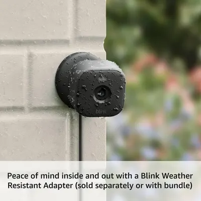 Demonstrates the product's waterproof capability by showing water droplets on the camera, reassuring shoppers it can withstand outdoor weather conditions.