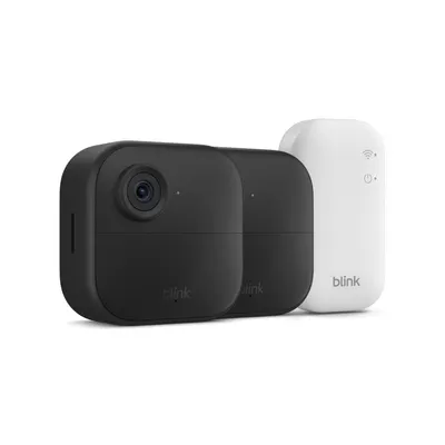 Shows the customer everything included in the purchase: two security cameras and the sync module hub, helping them understand the complete system they will receive.