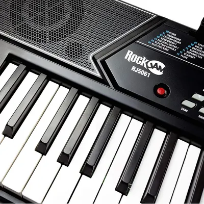 Highlights the physical components and features of the keyboard, including the speaker grille, brand model number, instrument selection panel, and control buttons to help shoppers understand the…
