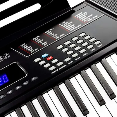 Highlights the keyboard's control interface and built-in rhythm/music style options to show shoppers the variety of sounds and functions available.