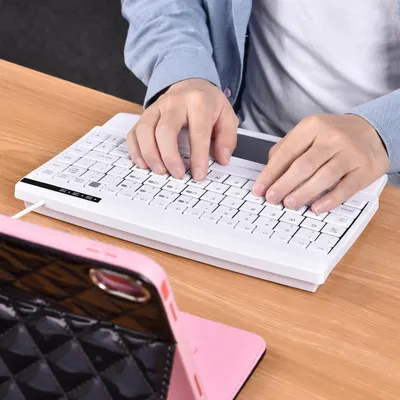Demonstrates the product in a natural work environment to help shoppers visualize how the keyboard fits into their daily routine.