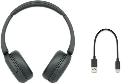 Shows the customer exactly what comes in the box: the headphones and a USB charging cable, helping set clear expectations about included accessories.