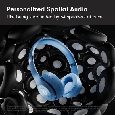 Communicates the advanced audio technology by quantifying the immersive listening experience as equivalent to being surrounded by 64 speakers, emphasizing the product's superior spatial audio…