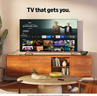 Communicates the brand's emotional positioning with the tagline 'TV that gets you' to build connection and trust with shoppers, emphasizing personalized content understanding.
